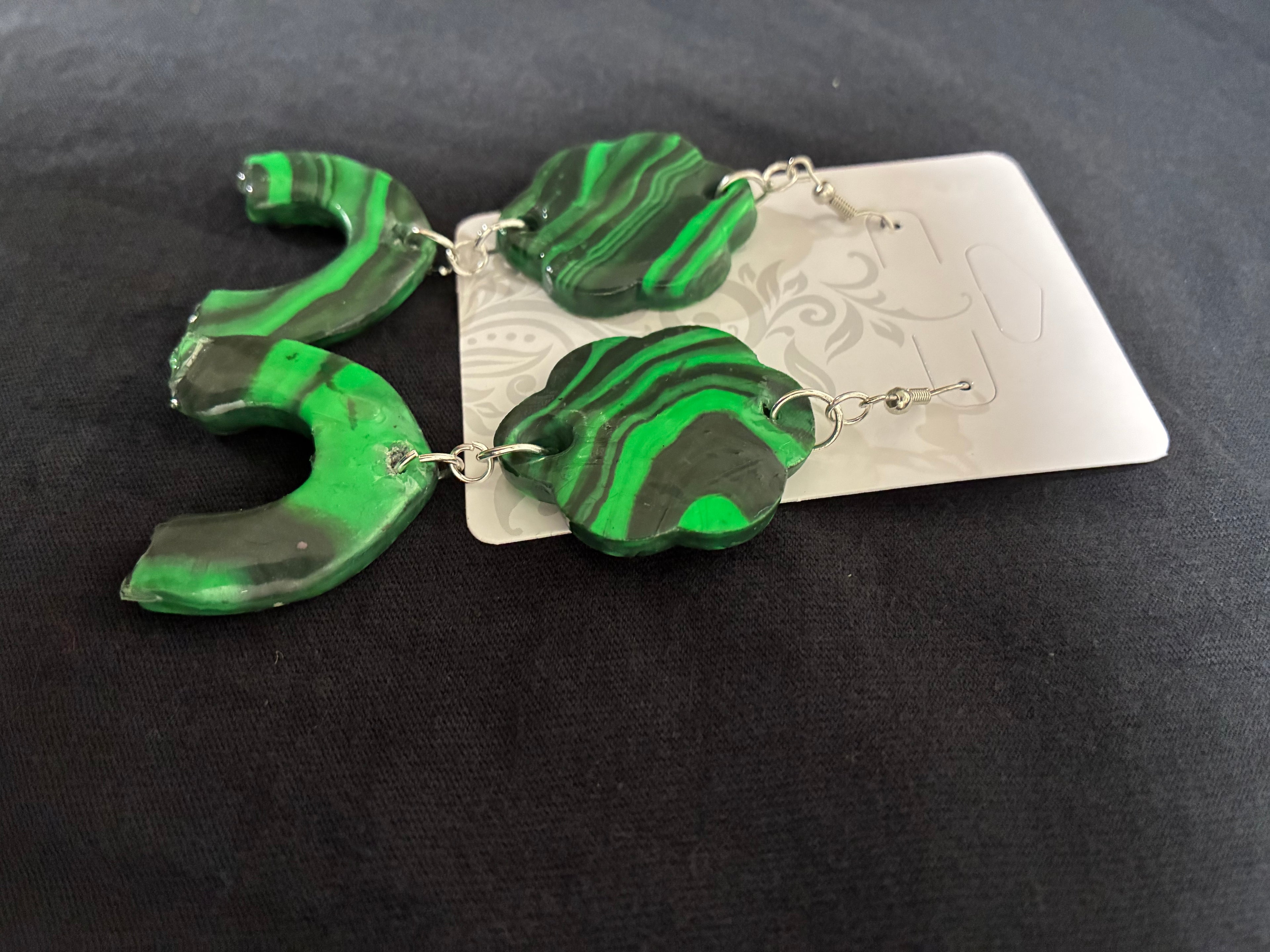 Green swirl clay dangle earrings