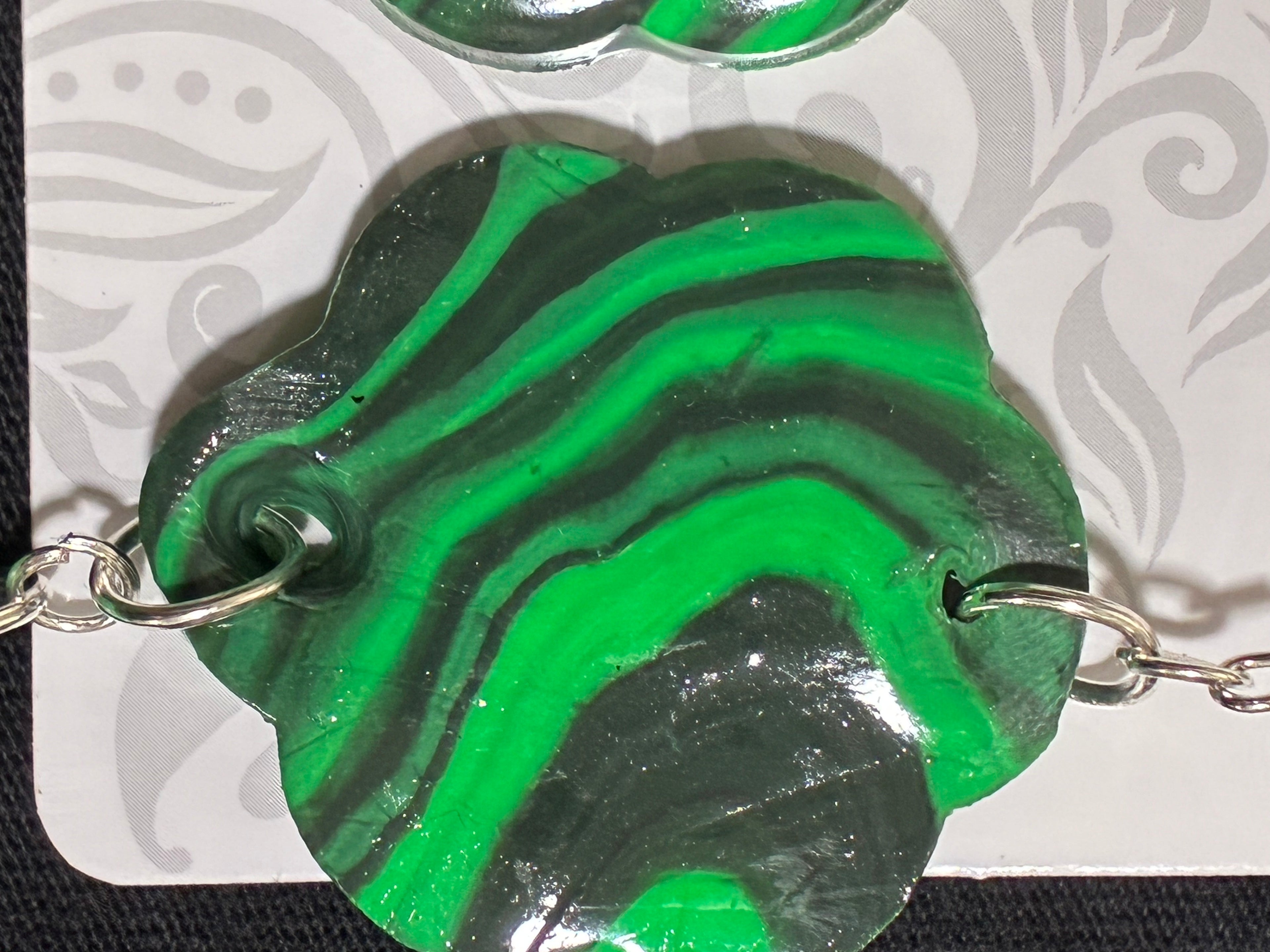 Green swirl clay dangle earrings