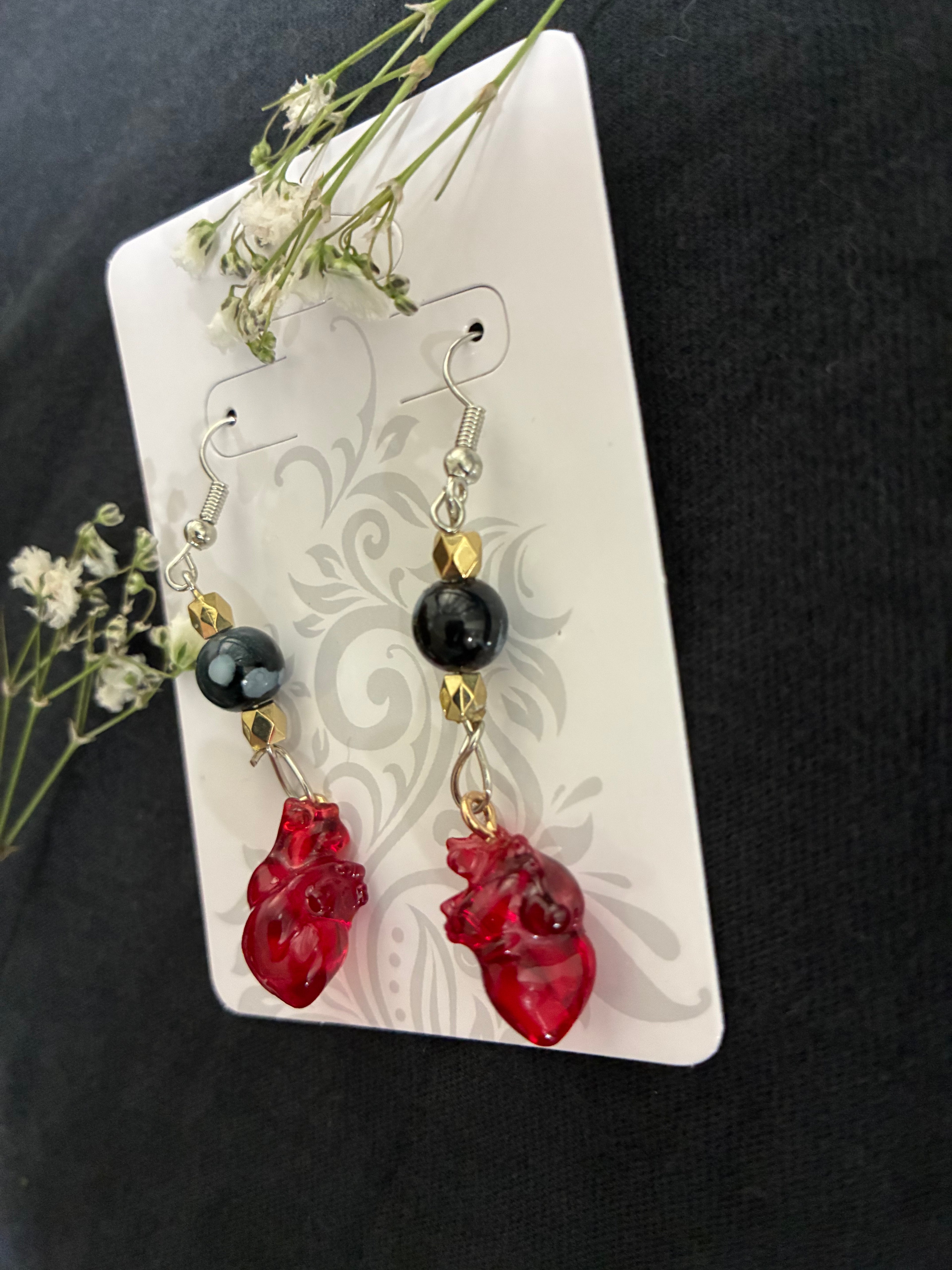 Anatomical beaded heart dangle earrings