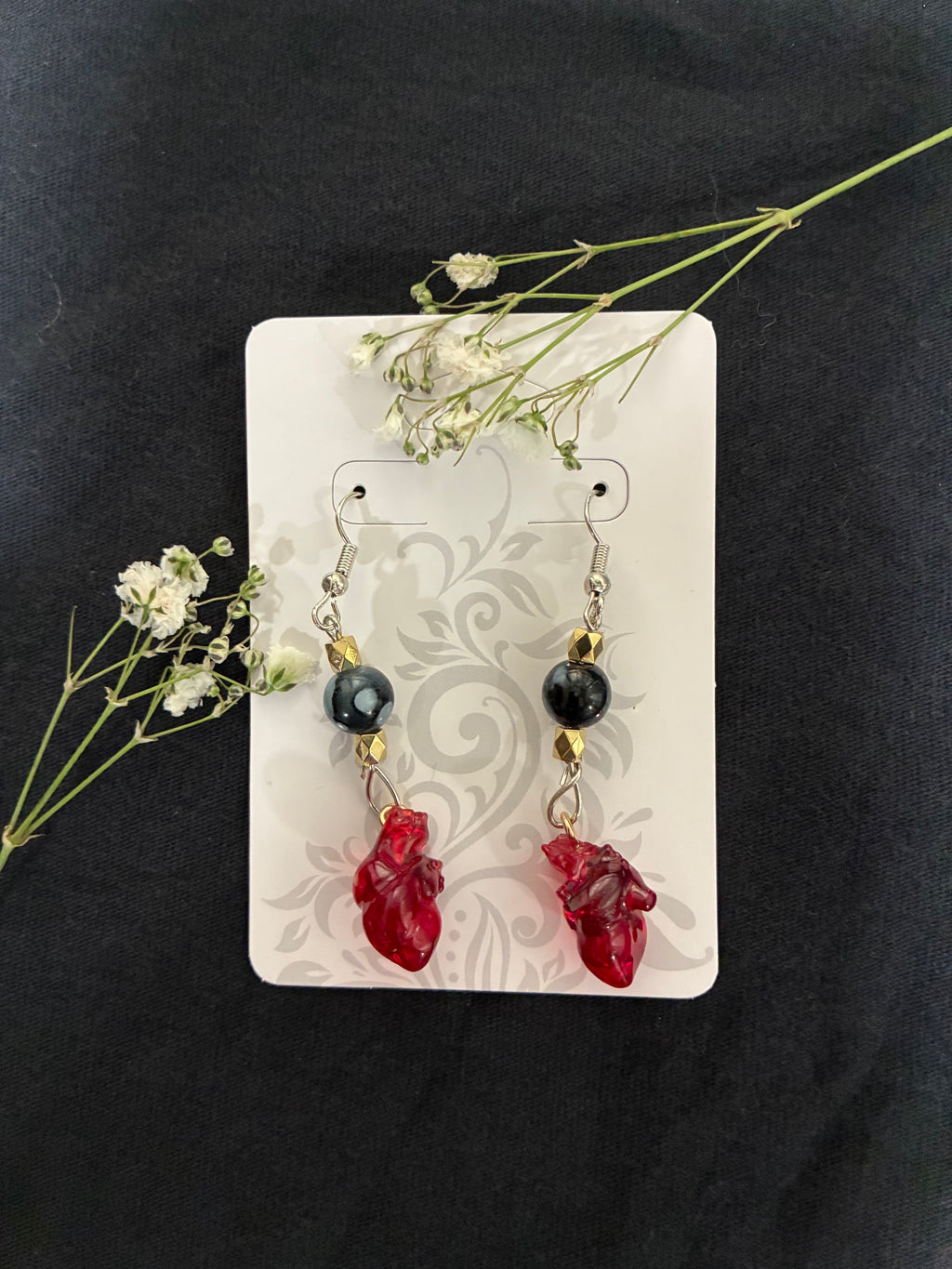 Anatomical beaded heart dangle earrings