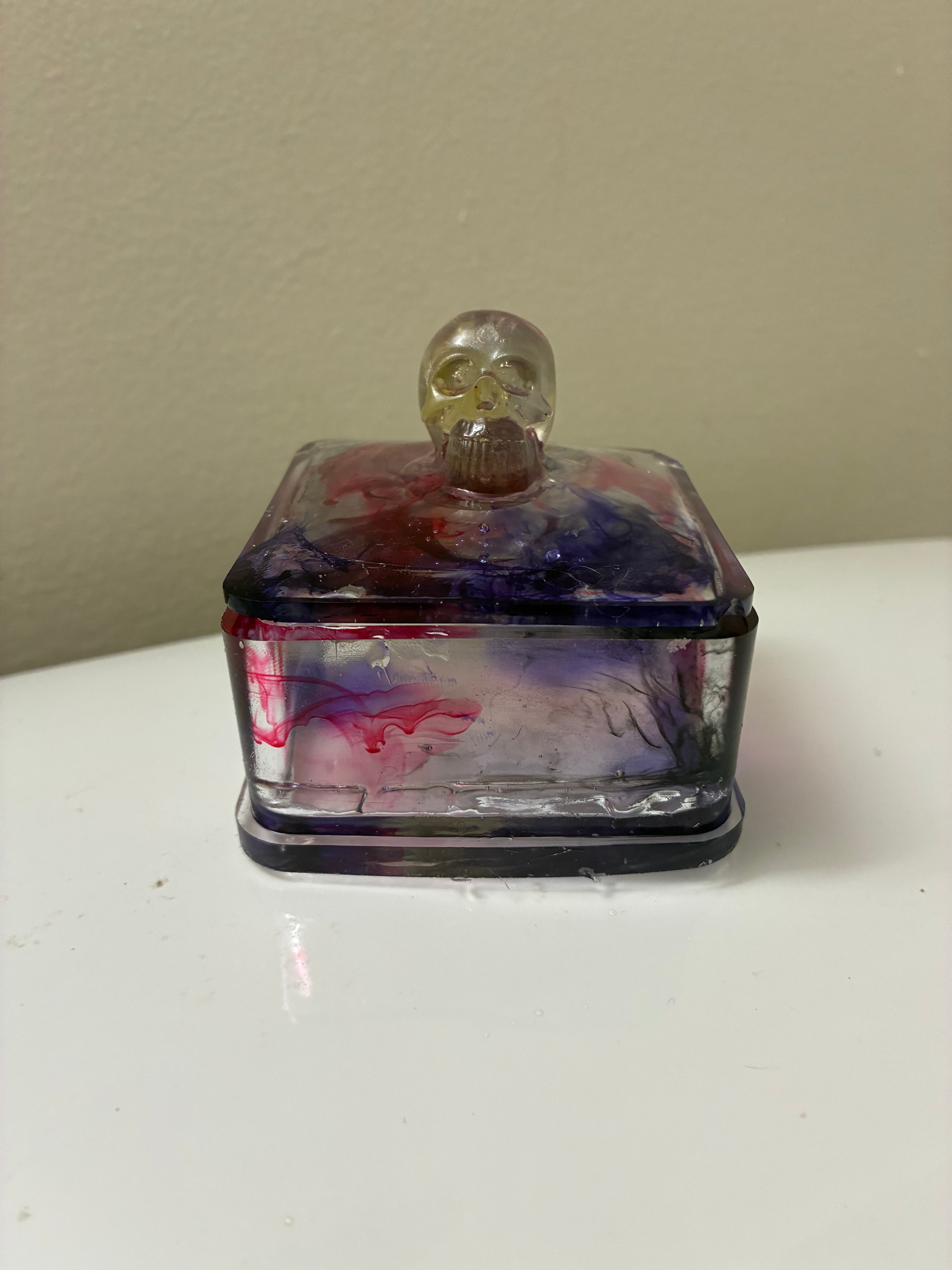 Color swirl trinket box with skull