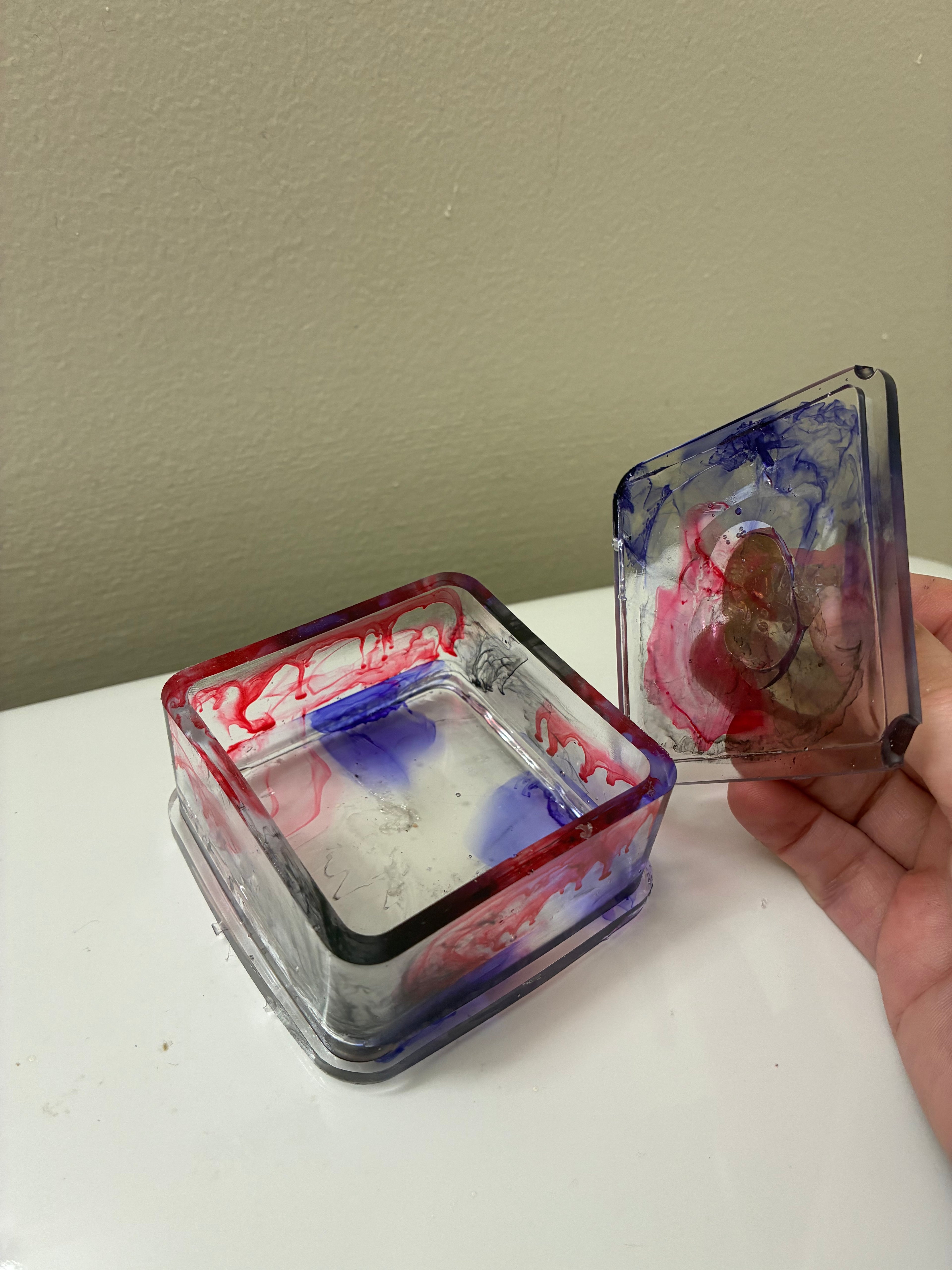 Color swirl trinket box with skull