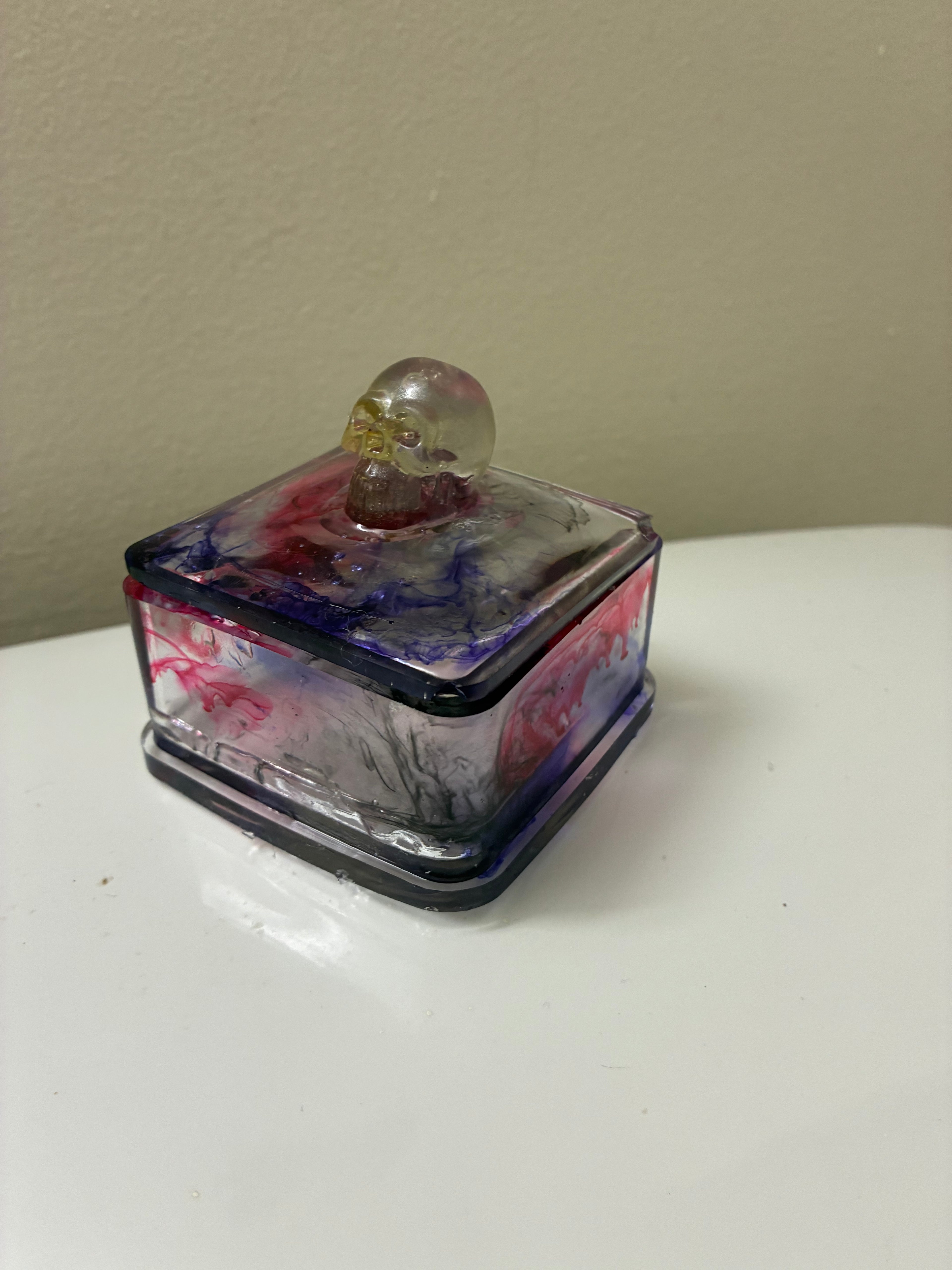 Color swirl trinket box with skull
